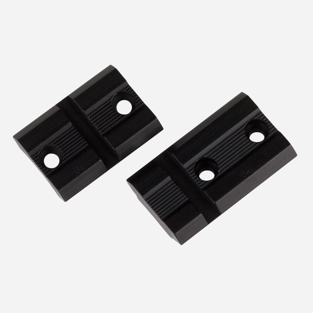 Two black plastic blocks on a white background