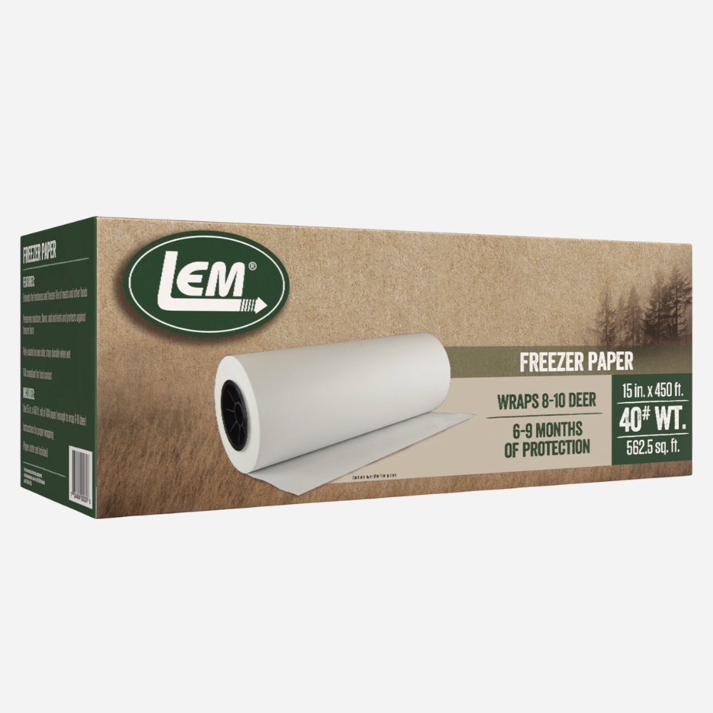 Box of LEM freezer paper with a roll of paper on a white background