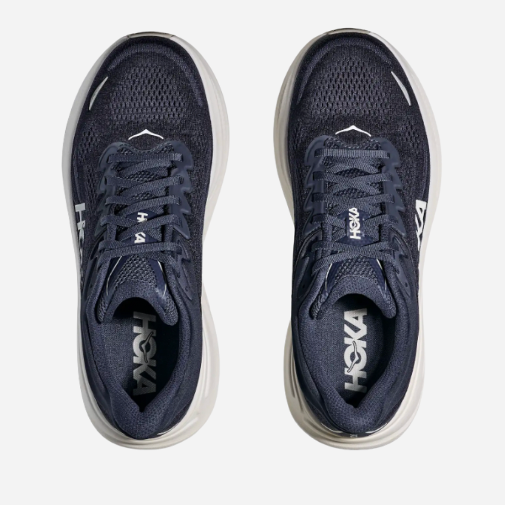 Pair of navy blue Hoka running shoes on a white background