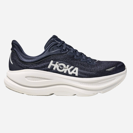 Navy running shoe with white sole on a light gray background