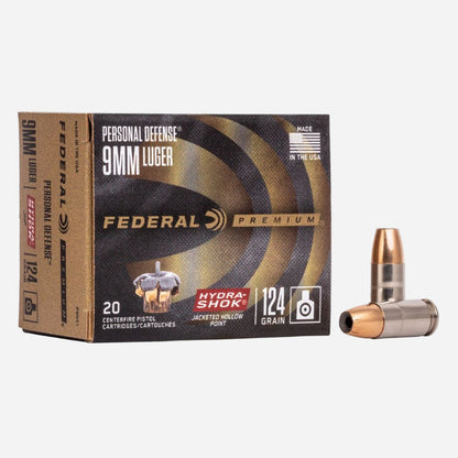 Federal Premium 9mm Luger ammunition box with a bullet on a white background