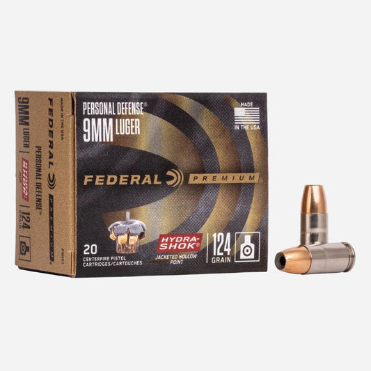 Federal Premium 9mm Luger ammunition box with a bullet on a white background