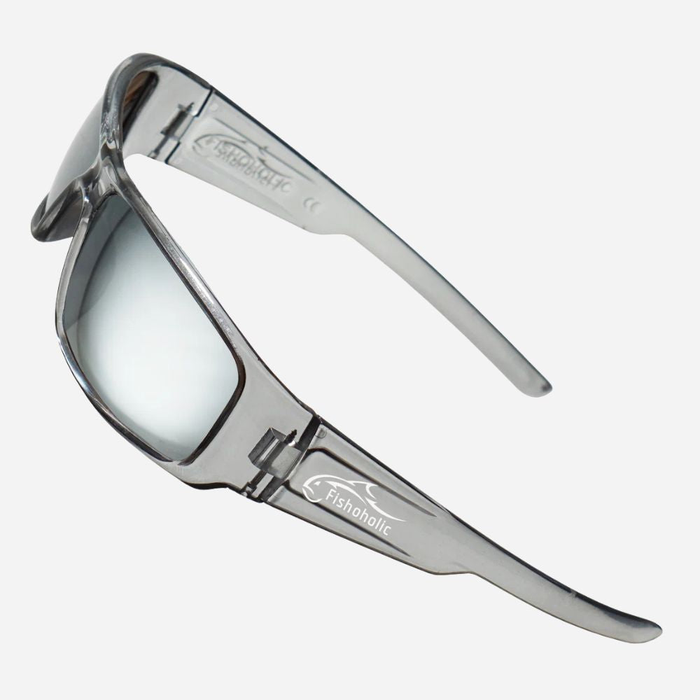 A pair of sporty wrap-around sunglasses with a translucent smoky gray frame and mirrored silver lenses, shown on a light gray background. The brand name 'Fishhook' is visible on the temple arm.