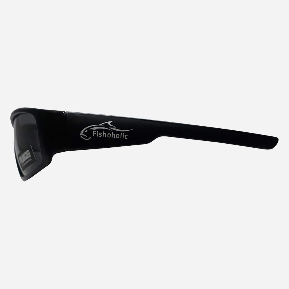 Black wrap-around sunglasses with a white Fishoholic logo printed on the side, shown against a light gray background.