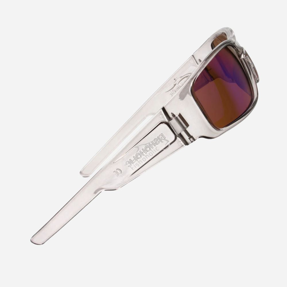 Clear acetate sunglasses with a silver metal hinge and a brown-to-purple mirrored lens, shown on a light gray background.