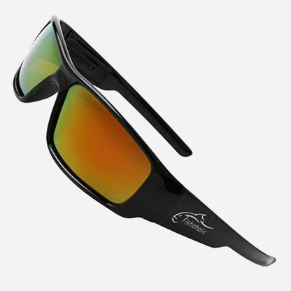 Black wrap-around sunglasses with mirrored orange-to-green gradient lenses, shown on a light gray background. The brand name 'Fenomenal' is printed in white on the temple arm.