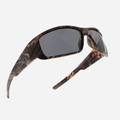 A pair of wrap-around sunglasses with a brown and black camouflage pattern on the frames and dark gray lenses, shown against a light gray background.