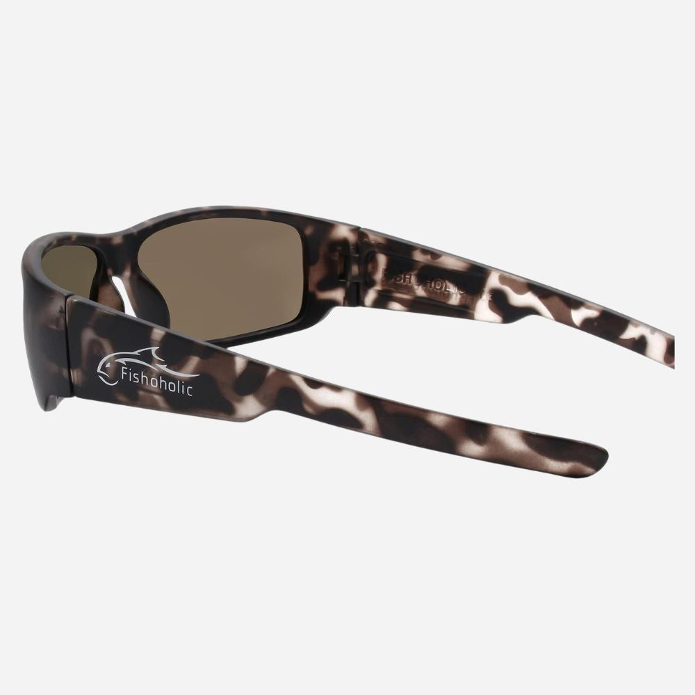 Fishholic sunglasses with a brown and black leopard print acetate frame and brown tinted lenses, shown on a light gray background.