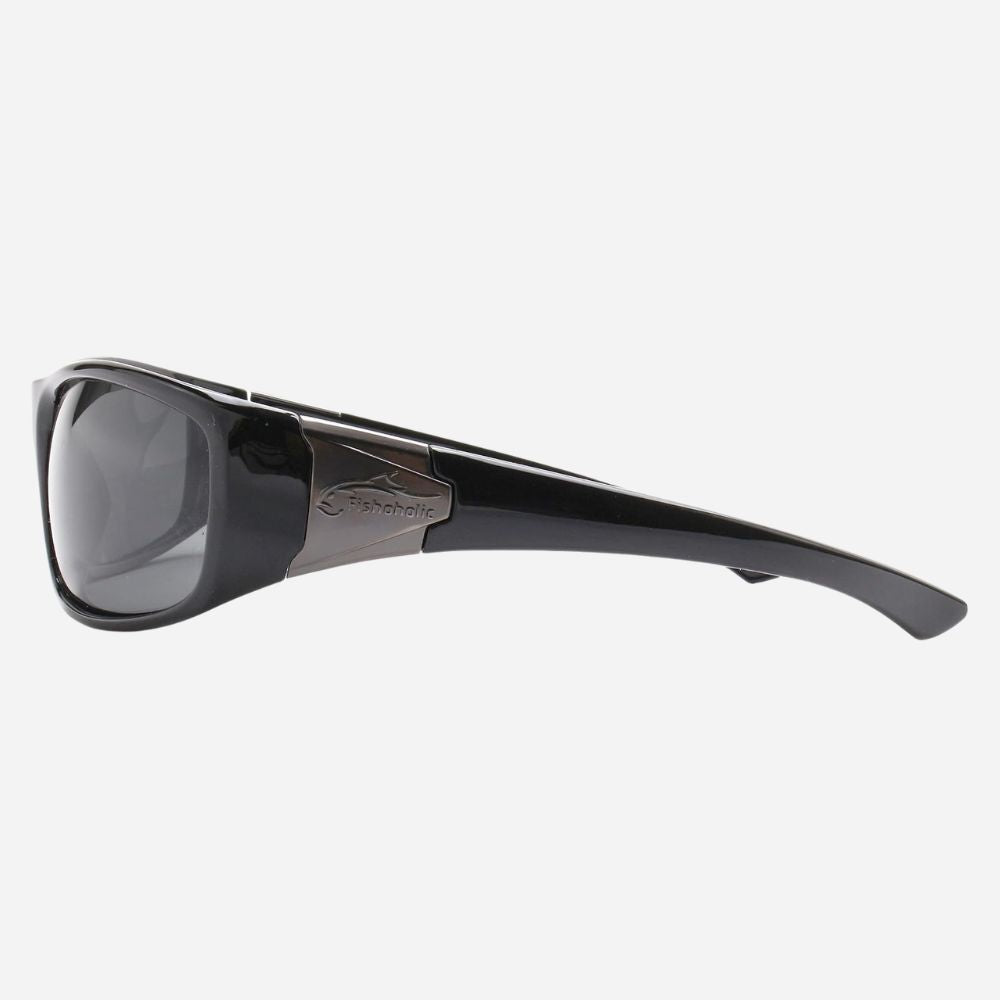 Black wrap-around sunglasses with dark lenses and a metallic silver temple featuring the Superdry logo, shown against a light gray background.