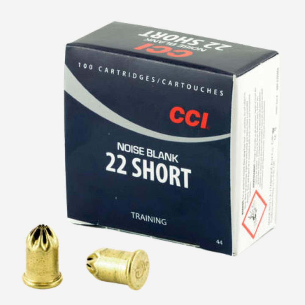 Box of CCI 22 Short noise blank ammunition with two brass cartridges on a white background