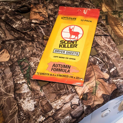 Pack of Scent Killer dryer sheets on a camouflage background