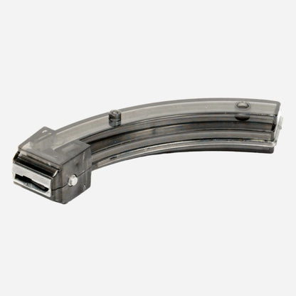A curved, transparent plastic magazine or clip with a dark gray metal end cap, shown on a plain light gray background.