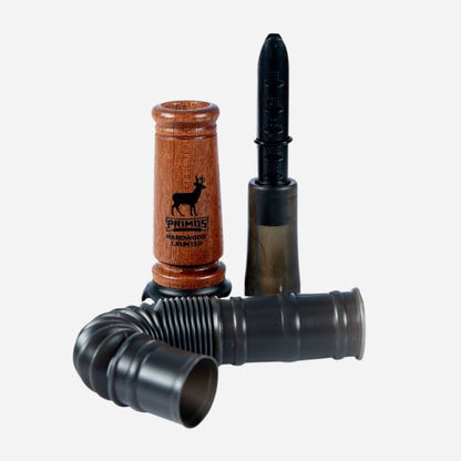 Wooden call with black components on a white background