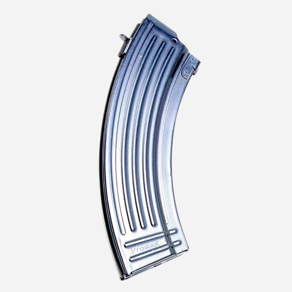 A curved metallic magazine with a ribbed design, featuring the brand name 'Promed' embossed near the base, shown against a plain white background.