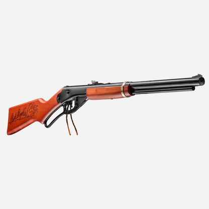 Toy gun with orange and black design on a white background
