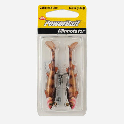 Packaged PowerBait Minnotator fishing lures with a clear front on a white background