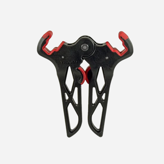 Black and red archery bow stand on a white background