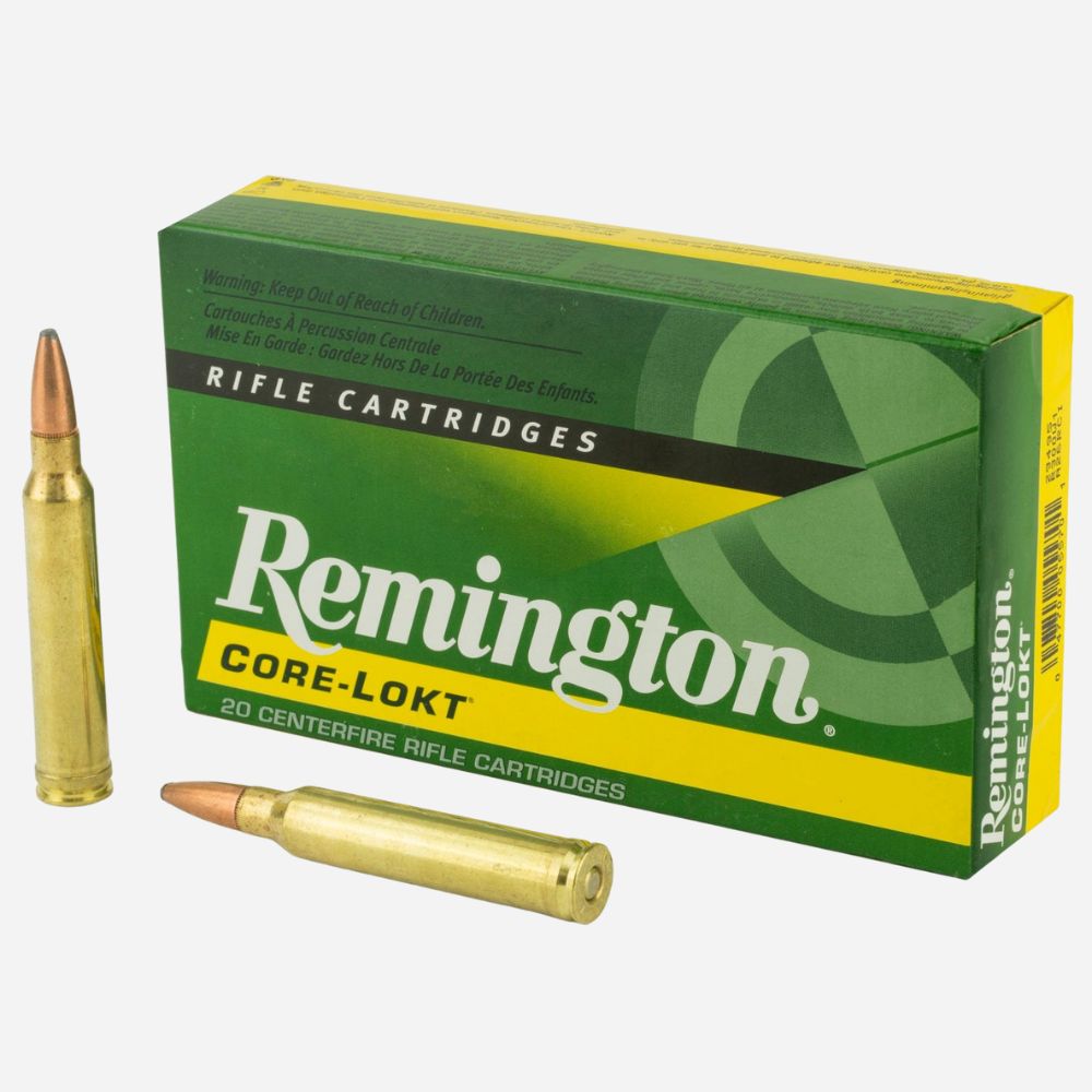 Remington Core-Lokt rifle cartridges with a box on a white background