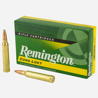 Remington Core-Lokt rifle cartridges with a box on a white background