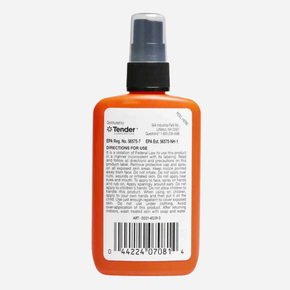 Orange spray bottle with a label on a white background