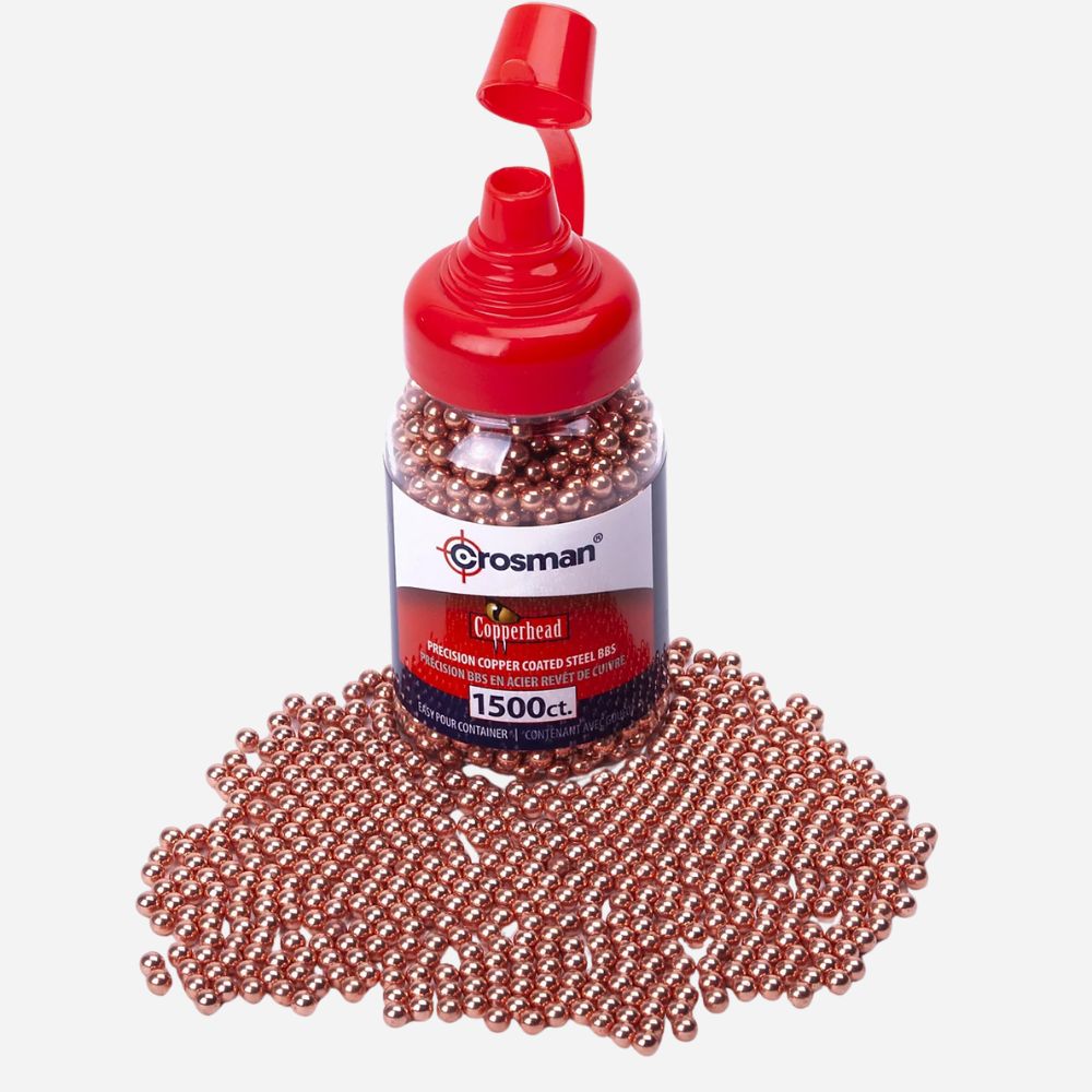 Bottle of Crosman copper beads with a white background