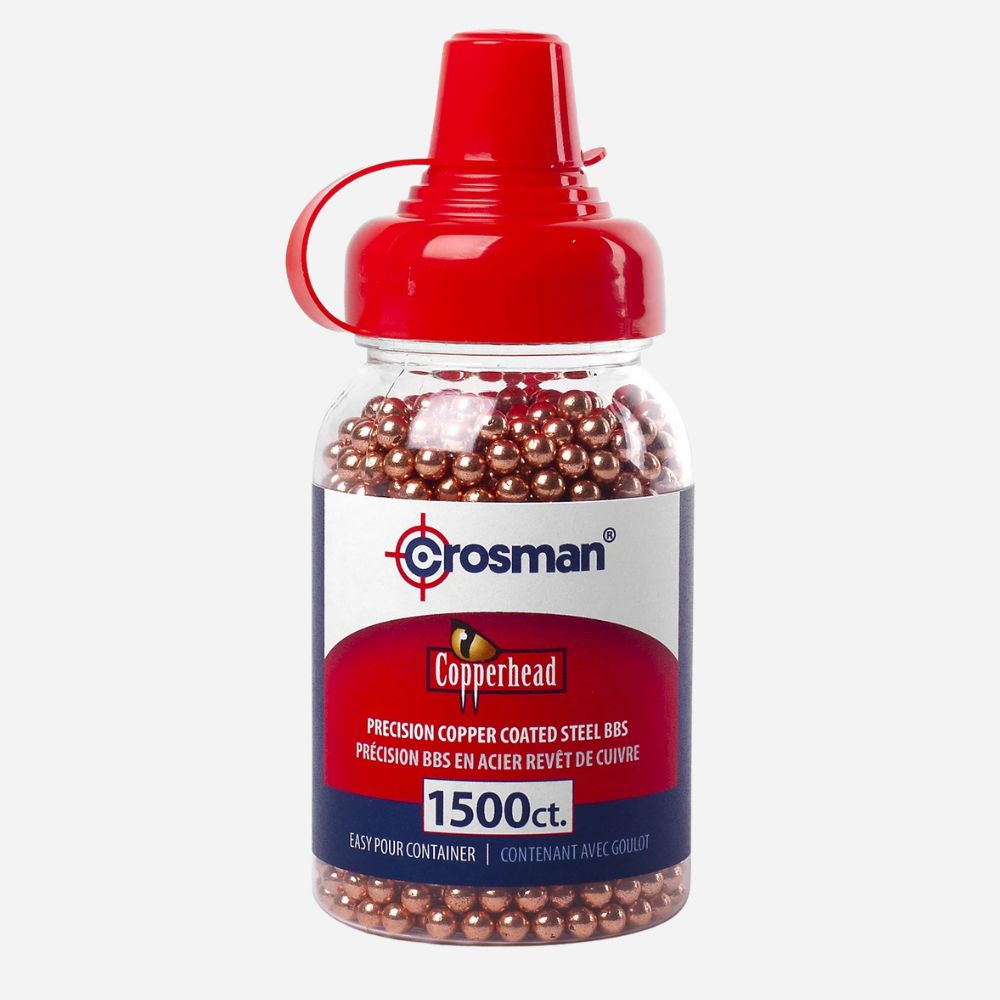 Bottle of Crosman Copperhead airgun pellets with a red lid on a white background