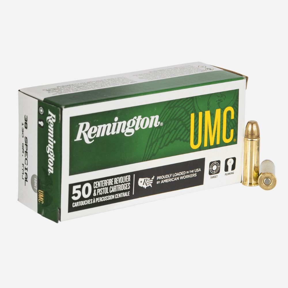Remington UMC ammunition box with bullets on a white background