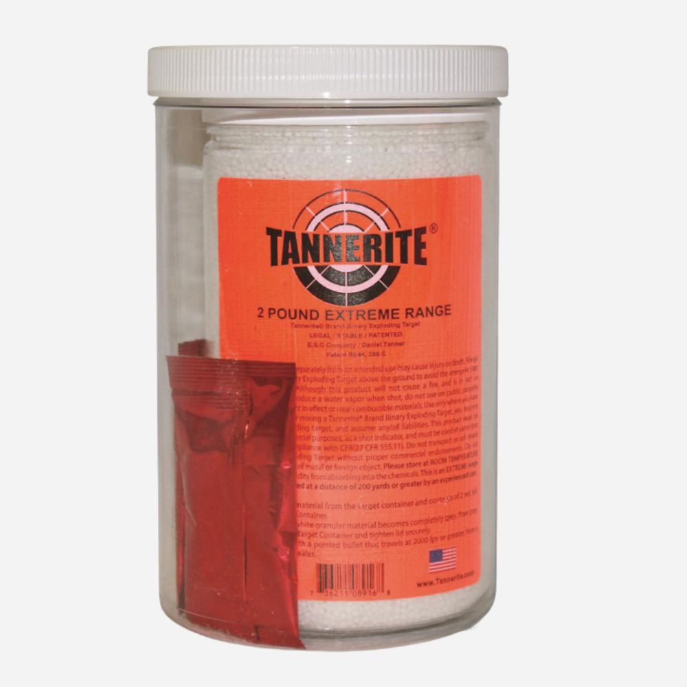 A clear plastic jar of Tannerite 2 Pound Extreme Range firework powder with a white screw-top lid and a bright orange label, shown on a light gray background.