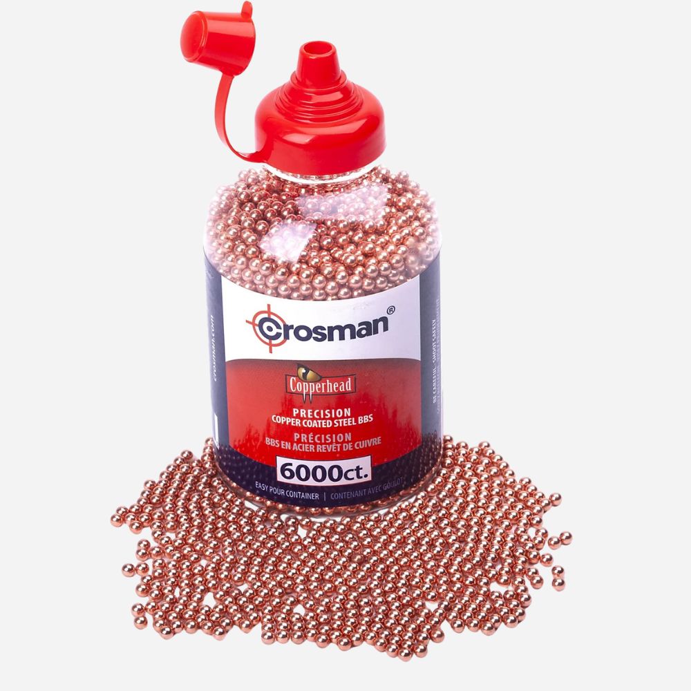 Bottle of Crosman copperhead pellets with a red cap on a white background