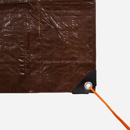 Brown tarp with a corner fastened with an orange rope on a white background