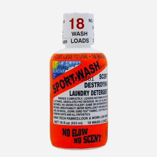 Bottle of laundry detergent with orange label and white cap on a white background