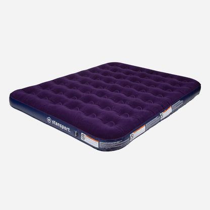 Purple inflatable mattress with 'stansport' branding on a white background