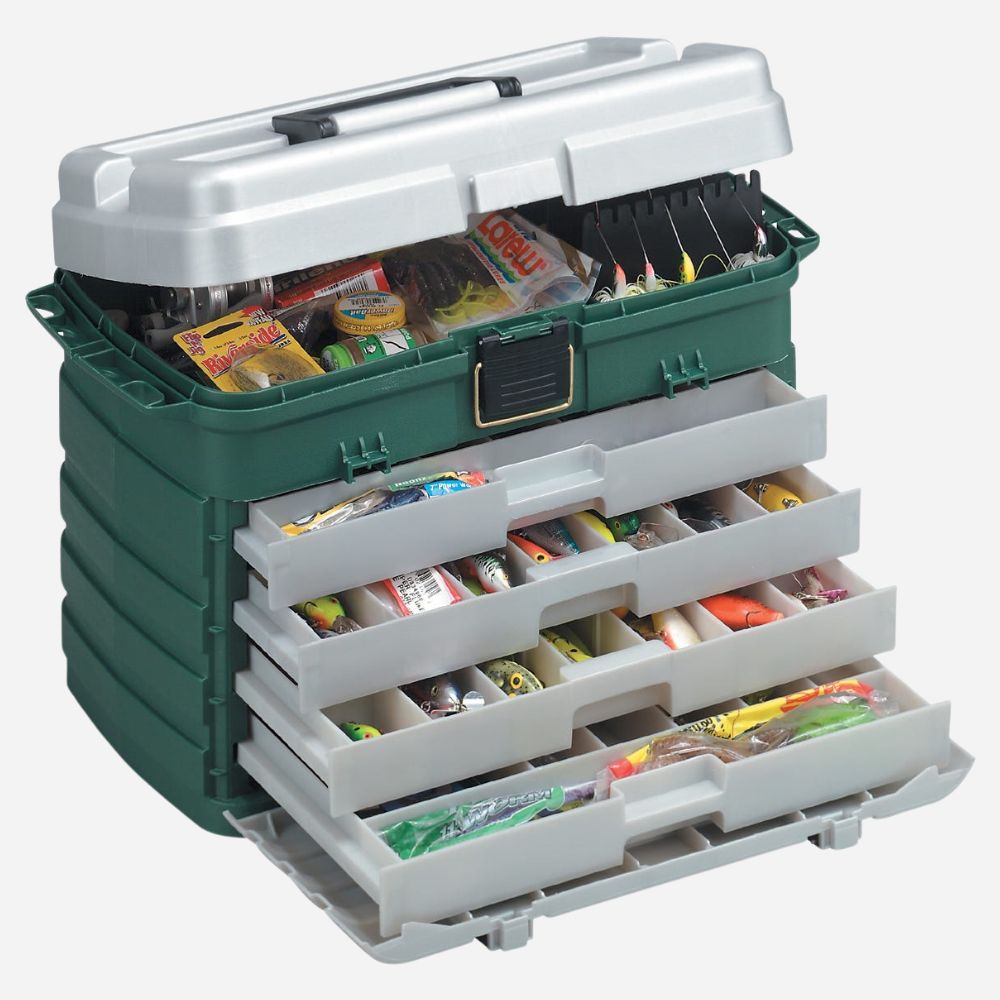 Fishing tackle box with multiple drawers containing various fishing lures on a white background
