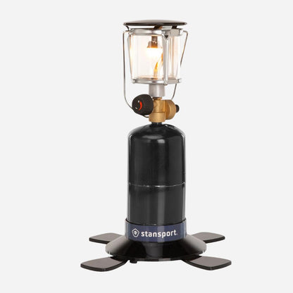 Black camping lantern with visible 'stansport' branding on a white background