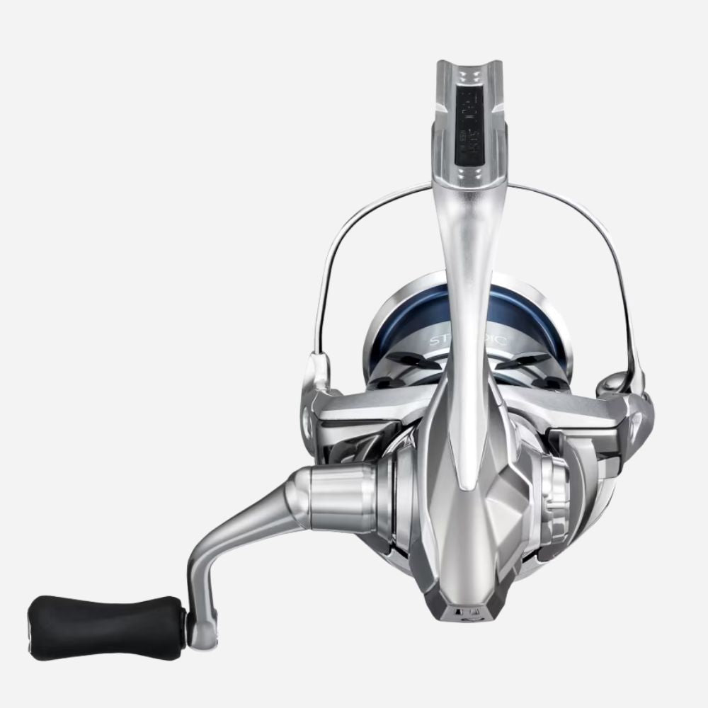 Fishing reel with metallic finish on a white background