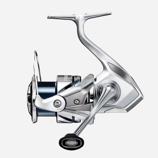 Silver fishing reel on a white background