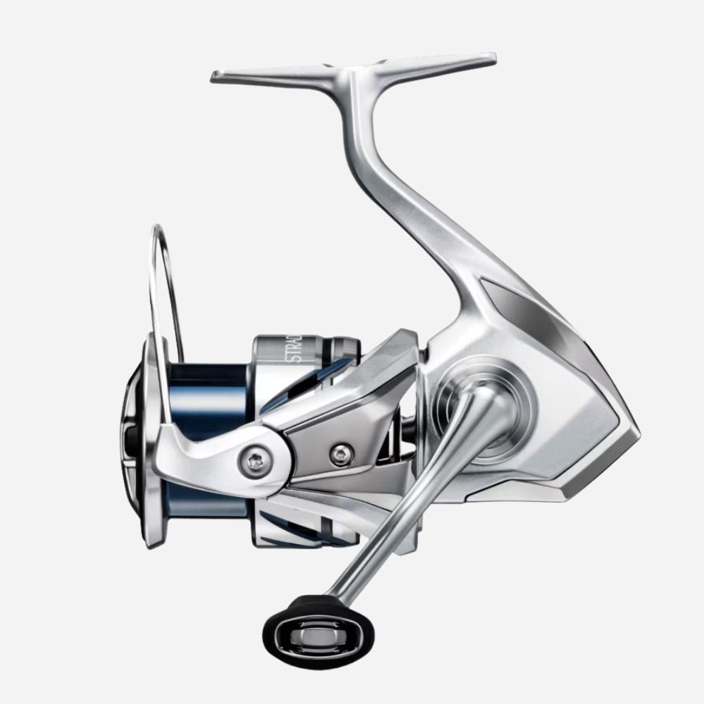 Silver fishing reel on a white background