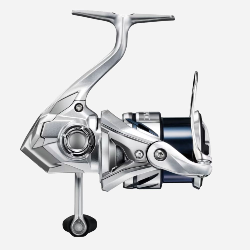 Silver fishing reel on a white background