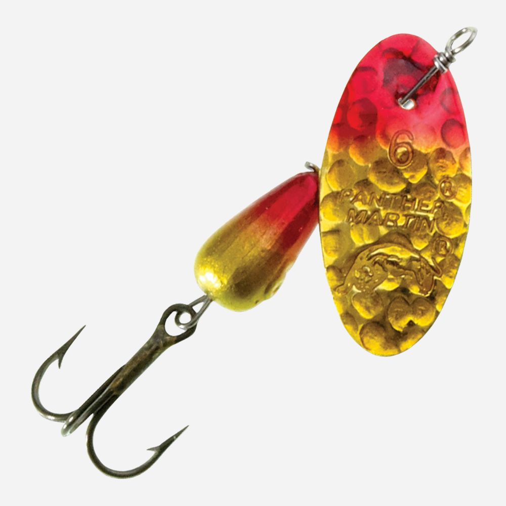 Fishing lure with red and yellow colors on a white background