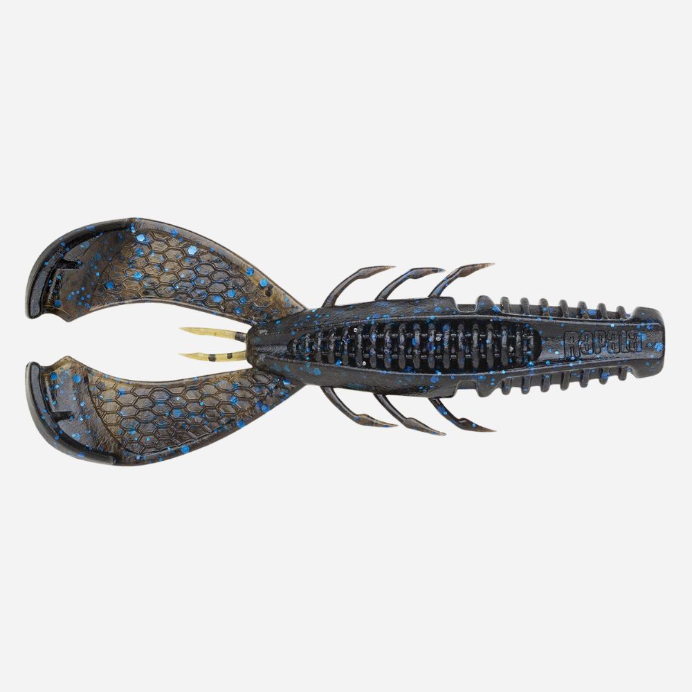 A soft plastic crawfish fishing lure with a dark gray and black body, blue glitter scales, and gold-tipped hooks, shown against a plain light gray background.