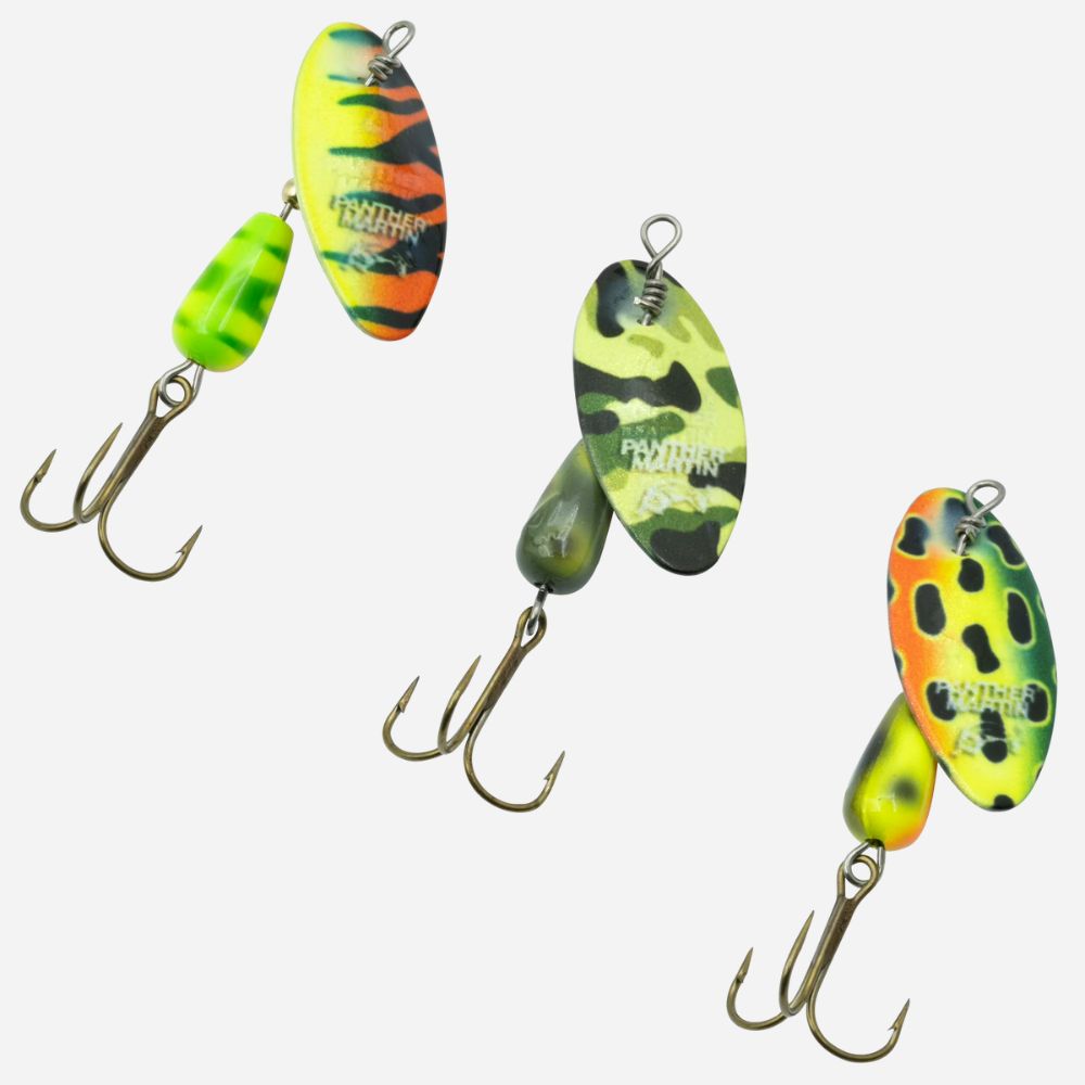 Colorful inline spinner fishing lures with camouflage and frog patterns, treble hooks, and metal blades for freshwater trout and bass fishing.