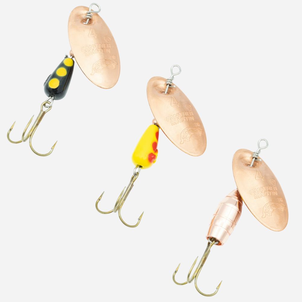 Panther Martin inline spinner fishing lures with copper blades and treble hooks in assorted colors.