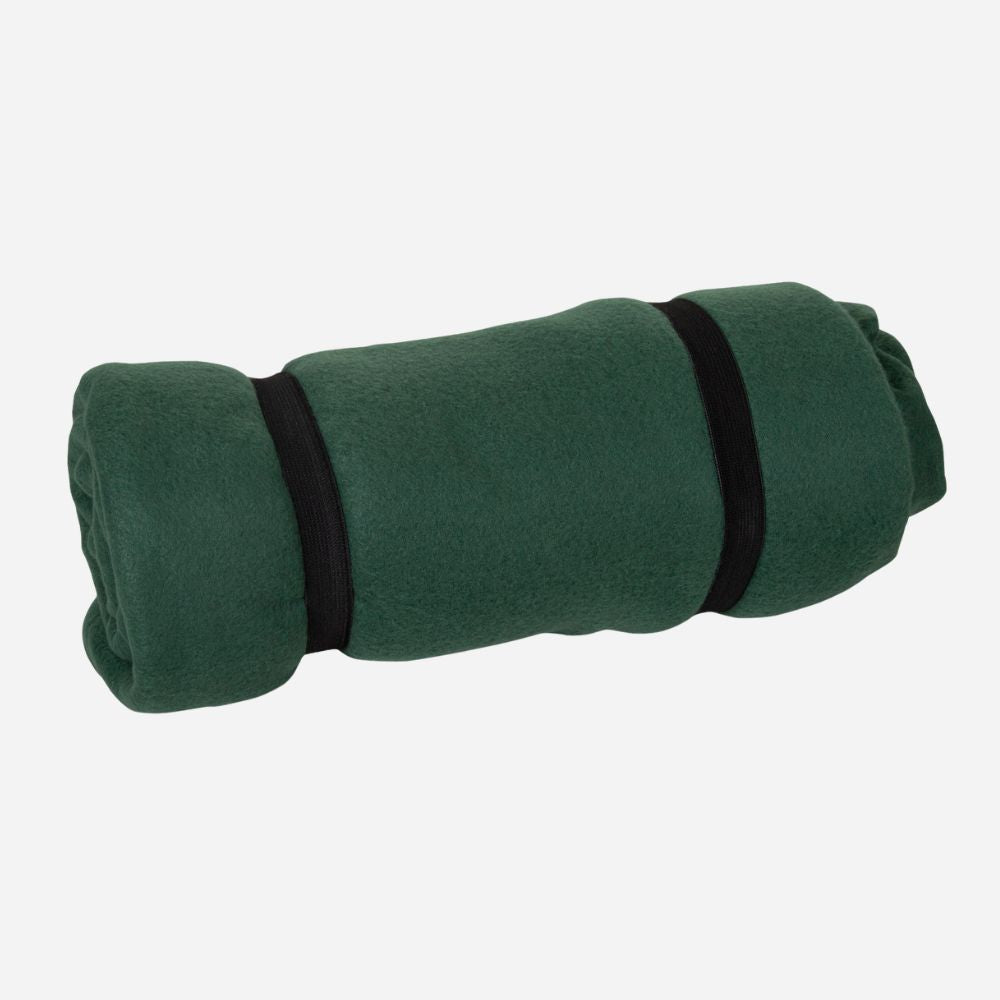 Rolled-up green blanket with black straps on a white background