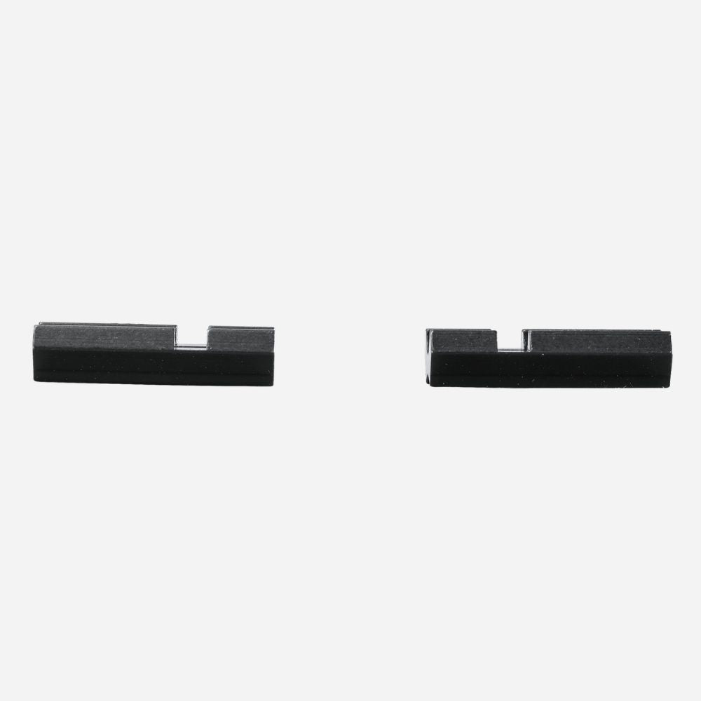 Two black metal brackets on a white background