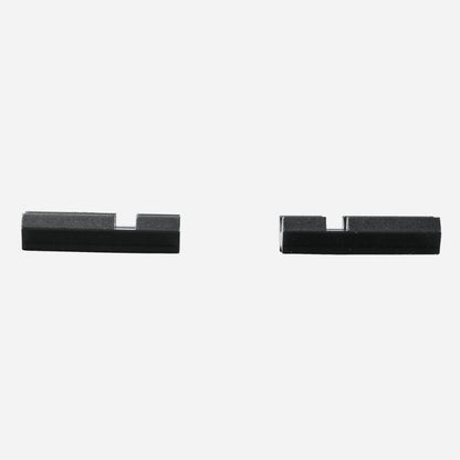 Two black metal brackets on a white background