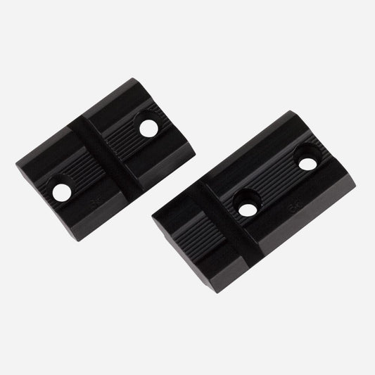 Two black plastic blocks on a white background
