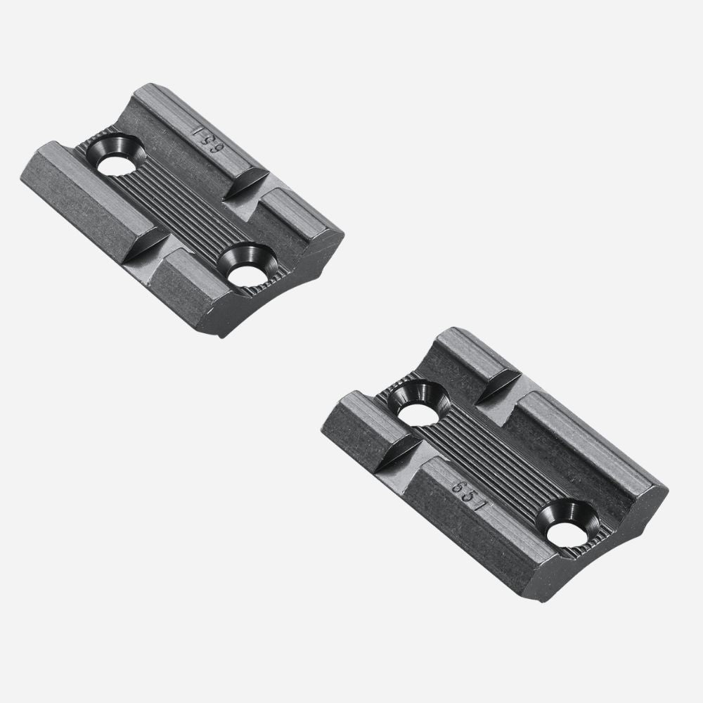 Two black metal brackets on a white background