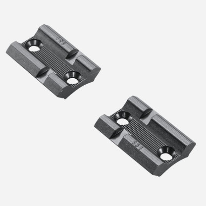 Two black metal brackets on a white background