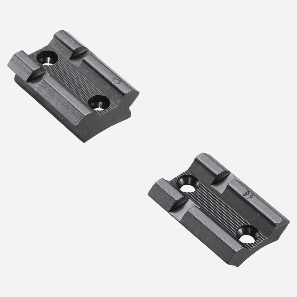 Two black metal brackets on a white background