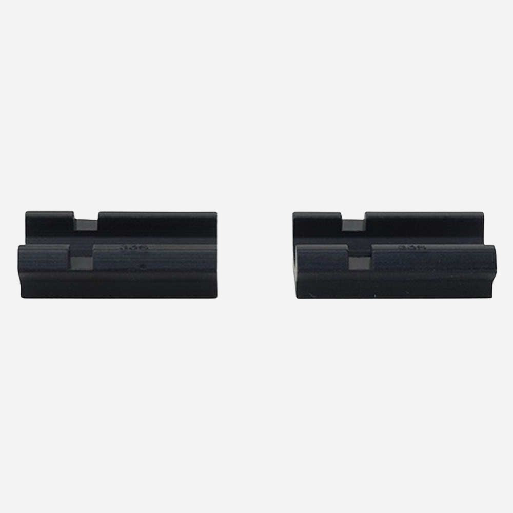 Two black rifle scope rings on a white background